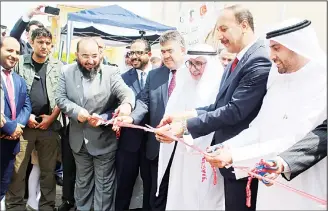  ?? KUNA photo ?? Kuwait-based Al-Najat Charity’s Ibrahim Al-Bader with Turkey’s Governor of Sunliurfa Abdullah Erin and other officials open a new school for Syrian refugees in Turkey.