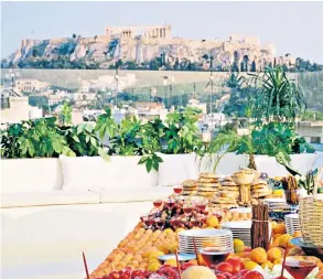  ?? ?? i The real Greek: Apollo Palm, in Athens, has double rooms from £118