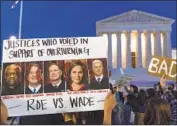  ?? Jacquelyn Martin Associated Press ?? ABORTION RIGHTS advocates demonstrat­e Tuesday in front of the U.S. Supreme Court.