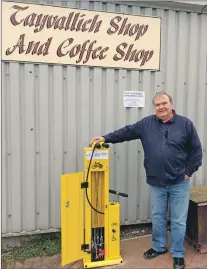  ??  ?? Tayvallich Café and General Store owner Nicholas Mes at the new bike repair station.