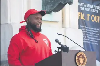  ?? PHOTOS BY JOHN BERRY— THE TRENTONIAN ?? Dontae Thomas speaks at Trenton’s press conference Wednesday do discuss the city’s re-entry program. He spoke about creating his own business as a way of keeping himself off the streets after leaving prison.