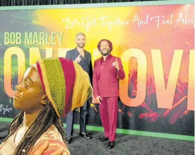  ?? AP PHOTOS ?? Kingsley Ben-Adir, left, the star of ‘Bob Marley: One Love’, poses with Marley’s son Ziggy at the premiere of the film, on February 6, in Los Angeles.