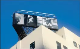  ?? PHOTO BY GEORGE AVALOS — STAFF ?? Artwork created by Cinque Mubarak, an Oakland photograph­er, is visible in downtown Oakland, where it was installed by tech company Square at the firm’s Uptown Station headquarte­rs building.