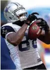  ?? Associated Press ?? Dallas Cowboys wide receiver Dez Bryant makes a catch during training camp Aug. 1 in Oxnard, Calif.