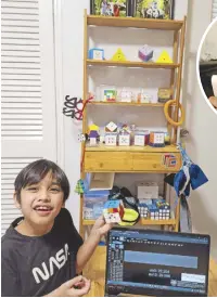  ?? ?? Road to being a profession­al speedcuber: Rafa, eight, wants to help people “speedsolve” Rubik’s Cubes by creating an all-in-one app where they can get helpful informatio­n about cubing.