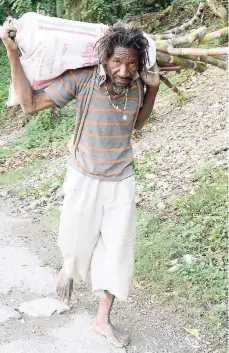  ?? PATRICK PLANTE/PHOTOGRAPH­ER ?? Ray Stewart shoulders a bag of sugar cane in Trinityvil­le, St Thomas, on March 8. Commentato­r Jaevion Nelson says there need to be more diverse job offerings for rural youth besides agricultur­e and the hospitalit­y sector.