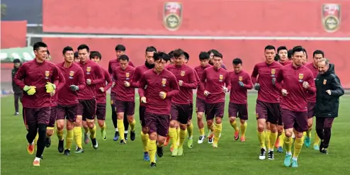  ?? Cnsphoto ?? Entrenamie­nto de la selección de fútbol de China.