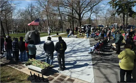  ?? BILL UHRICH — MEDAINEWS GROUP ?? Veterans, families and friends gather Friday at the Vietnam Veterans Memorial in City Park to celebrate National Vietnam Veterans Day.