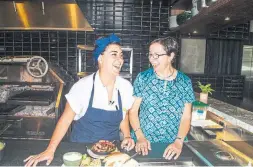  ?? CARLOS OSORIO/TORONTO STAR ?? Paula Navarrete, left, head chef at Kojin, makes rice and beans with her mother, Marta Mejia. It was a common school lunch for the family.