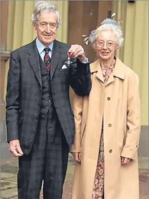  ?? Picture: PA. ?? Peter Cox and his wife Patricia at Buckingham Palace.