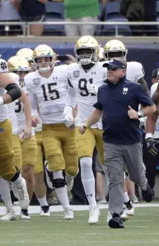  ?? AP FIle ?? WAKE UP THE ECHOES: The Atlantic Coast Conference and Notre Dame are considerin­g whether the Fighting Irish will give up their treasured football independen­ce for the 2020 season and play as a member of the league.