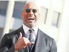  ??  ?? Dwayne Johnson has a notoriousl­y busy schedule. Would he have time to be president? JB LACROIX/WIREIMAGE