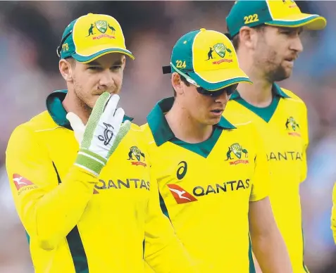  ?? Picture: GARETH COPLEY/GETTY ?? HARD DAY: Tim Paine leaves the field at the end of the England innings at Trent Bridge