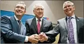  ?? ESTEBAN FELIX/AP ?? Canada’s Francois-Philippe Champagne, Chile’s Heraldo Munoz and New Zealand’s David Parker pose after signing a revised and renamed Trans-Pacific Partnershi­p.