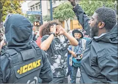  ??  ?? BLM protests Wednesday in Louisville, where two officers were shot.
