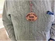  ??  ?? A Buck$ 4 Bikes elf badge is proudly worn by Oklahoma Bicycle Society volunteer John Wente.