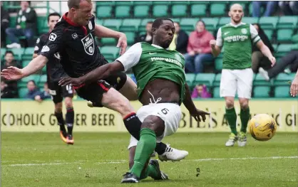  ??  ?? SAINT DAVID’S DAY: Clarkson beats Hibs defender Marvin Bartley to fire home St Mirren’s late winner at Easter Road