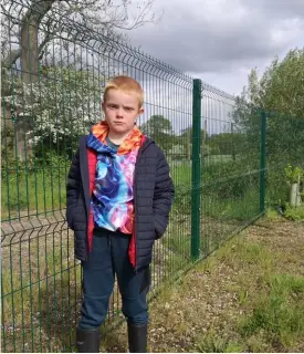  ?? Picture: Vicki Lewis ?? MAKE SPACE: Orson Lewis (8) has written a letter to the council, calling for park fences to have gaps for deer to escape, if they become trapped in the area