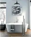  ?? MICO BATHROOMS ?? Floor-mounted towel rails save wall space.