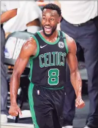  ?? Mark J. Terrill / Associated Press ?? The Boston Celtics’ Kemba Walker celebrates after a score against the Miami Heat during the an Eastern Conference final playoff game last season.