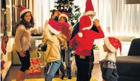  ??  ?? A Christmas dance party is a fun way to get the kids active