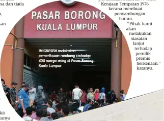  ??  ?? IMIGRESEN melakukan pemeriksaa­n rambang terhadap 600 warga asing di Pasar Borong Kuala Lumpur.
