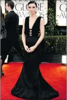  ??  ?? Dragon Tattoo star Rooney Mara has been turning heads with a dark look that echoes her character.