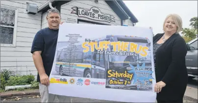  ?? GREG MCNEIL/CAPE BRETON POST ?? Stuff the Bus returns on Saturday. During the day-long event at No Frills grocery store people are encouraged to bring in non-perishable food items, gift cards and monetary donations. From the left, are Marco Amati, the kitchen manager, and Karen...