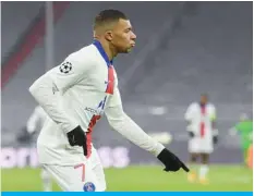  ??  ?? MUNICH: Paris Saint-Germain’s French forward Kylian Mbappe celebrates scoring the 2-3 goal during the UEFA Champions League quarter-final first leg football match against FC Bayern Munich in Munich, southern Germany, on April 7, 2021. — AFP