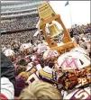  ??  ?? The unbeaten Golden Gophers (9-0, 6-0 Big Ten) celebrate with fans on the TCF Bank Stadium field after defeating Penn State.