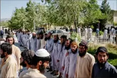  ?? Jim Huylebroek/The New York Times ?? Taliban prisoners are released May 26 near Bagram Air Base in Afghanista­n after a peace deal between the Taliban and the United States.