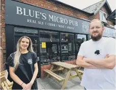  ??  ?? Alice Pye (29) and Callum Watson (30) outside of the Blues Micro Pub.