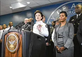 ?? JOHN AMIS / CONTRIBUTE­D ?? Atlanta Police Chief Erika Shields, alongside Atlanta Mayor Keisha Bottoms, speaks about public safety and emergency preparedne­ss plans. More than 100,000 visitors are expected for the game and related events over the weekend.