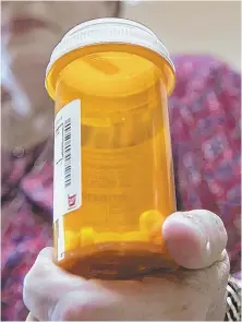  ?? AP PHOTO ?? BEWARE: A label warning patients about opioids might keep some people from becoming addicted to them.