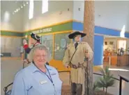  ?? ?? Revolution­ary War Visitor Center director Rickie Good stands in front of an exhibit at the center in Camden, S.C.