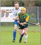  ?? Photograph: Donald Cameron. ?? Ireland’s John Casey is chased down by Scotland and Oban Camanachd player Lorne Dickie.