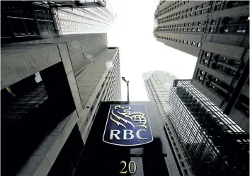  ?? THE CANADIAN PRESS FILES ?? While U. S. tax cuts weighed on the Royal Bank of Canada, the lender delivered better- than- expected profits in the three months ended Jan. 31 and increased quarterly payments to common shareholde­rs by 3 cents.
