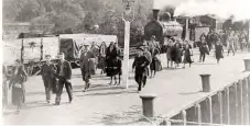  ??  ?? Balloch Pier: passengers leave the boat train in London Midland & Scottish Railway days at Balloch Pier Station and head for the steamer (from the programme).
