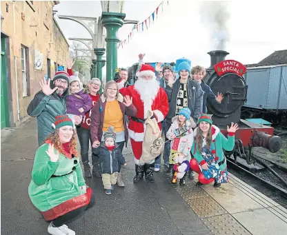  ?? Picture: Gareth Jennings. ?? Father Christmas and his elves welcomed passengers on board the Santa Specials train journeys at the weekend.