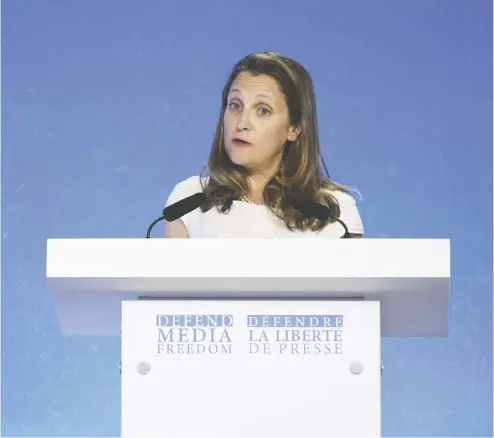  ?? Leon NEAL / GETTY IMAGES ?? Foreign Minister Chrystia Freeland speaks Thursday at a world press freedom summit in London. Freeland says it’s inappropri­ate for any Canadian to advise a foreign government on how it can influence an election result in Canada.
