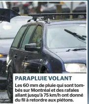  ??  ?? PARAPLUIE VOLANT
Les 60 mm de pluie qui sont tombés sur Montréal et des rafales allant jusqu’à 75 km/h ont donné du fil à retordre aux piétons.