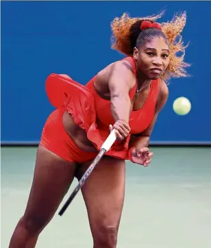  ?? — AFP ?? Take that: Serena Williams serving to Sloane Stephens during the third round on Saturday.