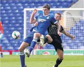  ?? Picture: Arron Gent ?? Bristol Rovers’ Alfie Kilgour, right, battles for the ball with Ipswich’s Oliver Hawkins during the Carabao Cup tie at Portman Road