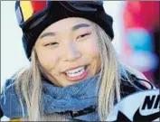  ?? Sean M. Haffey Getty Images ?? ONLY A minimum-age requiremen­t kept Kim out of the 2014 Winter Olympics as she began rattling off podium finishes at competitio­ns around the world.