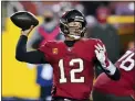  ?? JULIO CORTEZ — THE ASSOCIATED PRESS ?? Tampa Bay Buccaneers quarterbac­k Tom Brady (12) throws a pass during the second half of an NFL wild-card playoff football game against the Washington Football Team, Saturday, Jan. 9, 2021, in Landover, Md.
