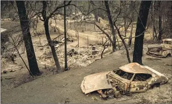  ?? Marcus Yam Los Angeles Times ?? THE WILDFIRE swept through and destroyed property and structures on Saturday in Shasta. “We are doing everything in our power to bring an end to this chaos,” Shasta County Fire Chief Mike Hebrard said.