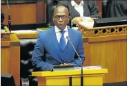  ?? Picture: ESA ALEXANDER ?? MONEY MATTERS: Investors demand higher interest rates from the government, fearing a downgrade of local currency credit rating after Finance Minister Malusi Gigaba’s medium-term budget last month