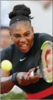  ?? CHRISTOPHE ENA — ASSOCIATED PRESS ?? Serena Williams returns a shot against Julia Goerges on Saturday.