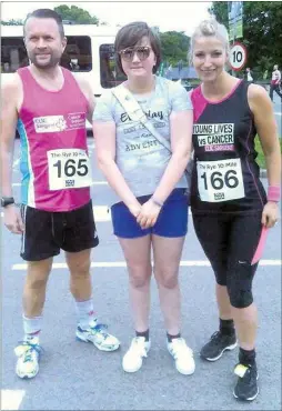  ??  ?? Sophie Harris with dad Trevor and mum Sally after running The Rye 10 race to raise funds