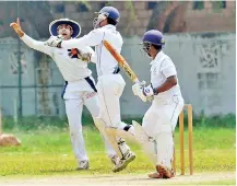  ??  ?? S.Thomas' batsman Trevin Iriyagama is being caught by Wesely skipper and wicket-keeper Thisuraka Akmeemana off Thenuka Perera. Pic by Ranjith Perera